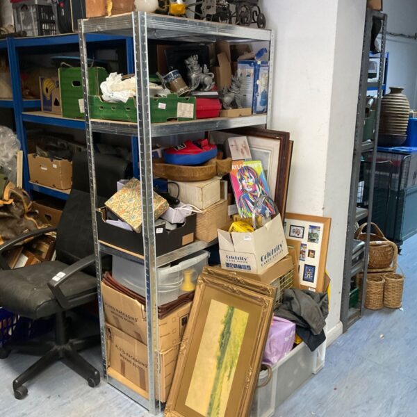 Mixed lot of art and collectibles including paintings and ceramics.