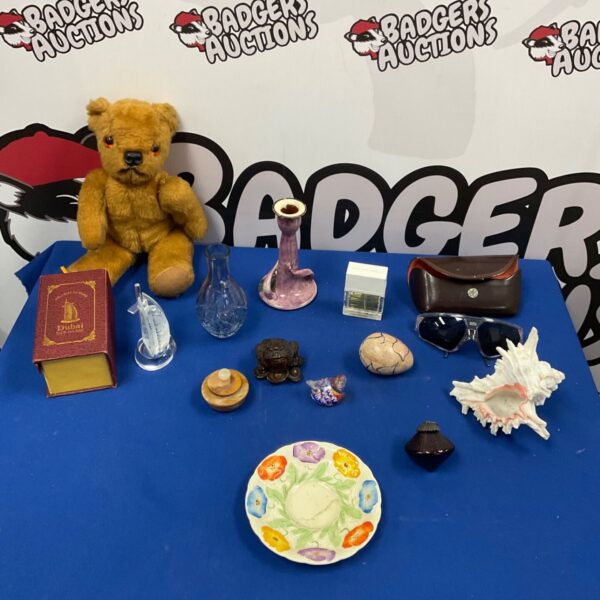 Mixed lot of vintage collectibles including a teddy bear and books.