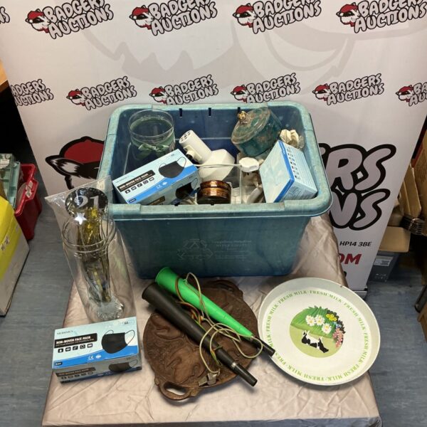 Mixed lot including face masks, a wooden tray, and a lamp.