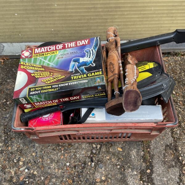Mixed lot featuring a BBC Sport game, tennis rackets, and African art.