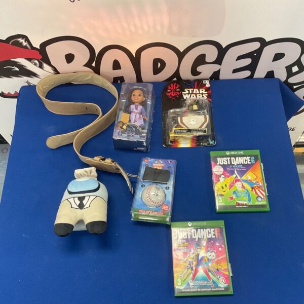 Mixed lot of toys and collectibles including Just Dance and Star Wars.