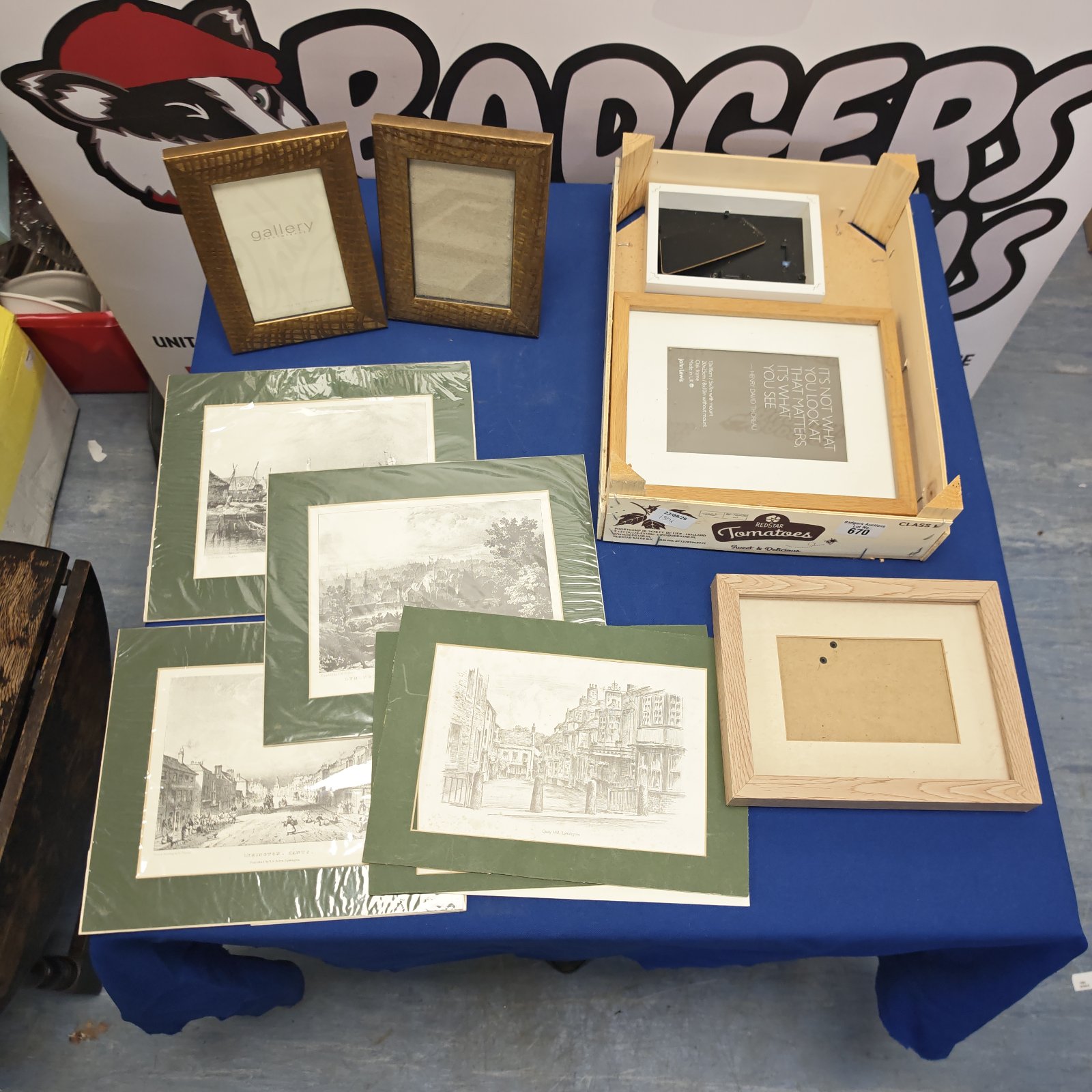 Mixed lot of vintage frames and unframed prints for wall decor.