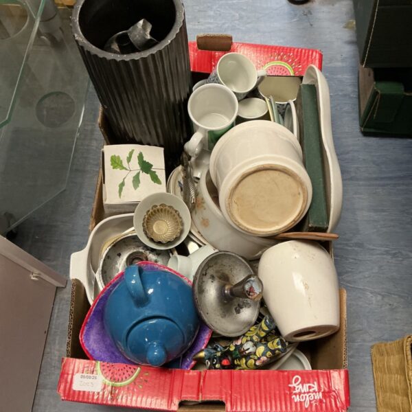 Mixed lot of vintage pottery and porcelain including teapots and mugs.