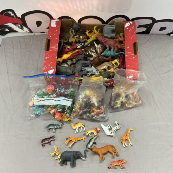 Collection of vintage plastic model animal figures.