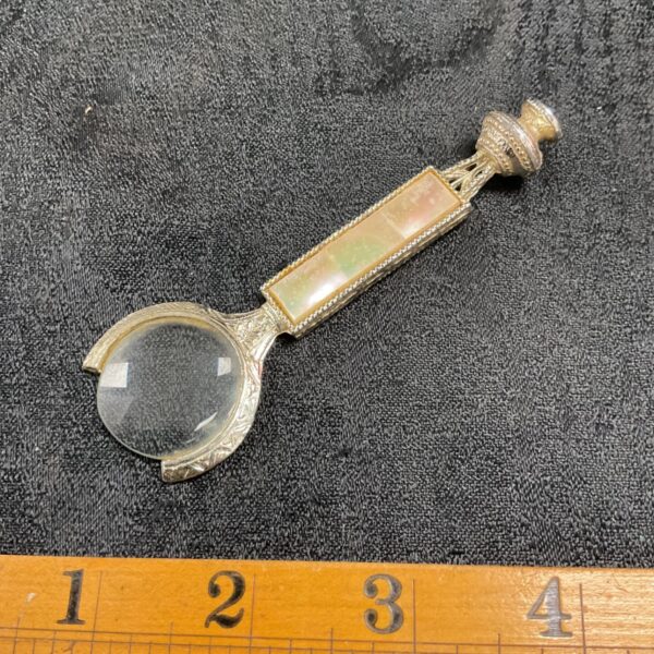 Antique mother of pearl magnifying glass, a beautiful Victorian reading aid.