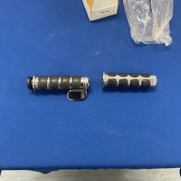 Pair of new black and chrome motorcycle twist grips.