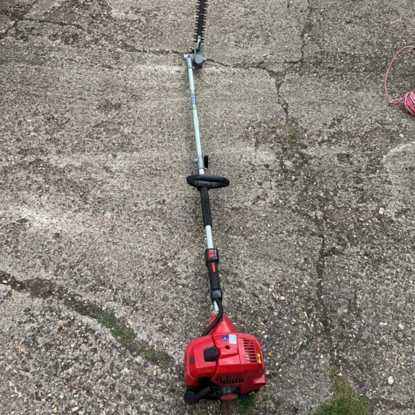 Red Mountfield long reach hedge trimmer for garden maintenance.