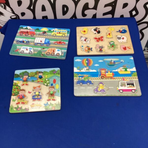 Set of four Mr Tumble wooden puzzles for early learning.