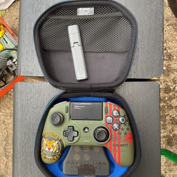 Nacon Revolution Pro Call of Duty controller with case and accessories.