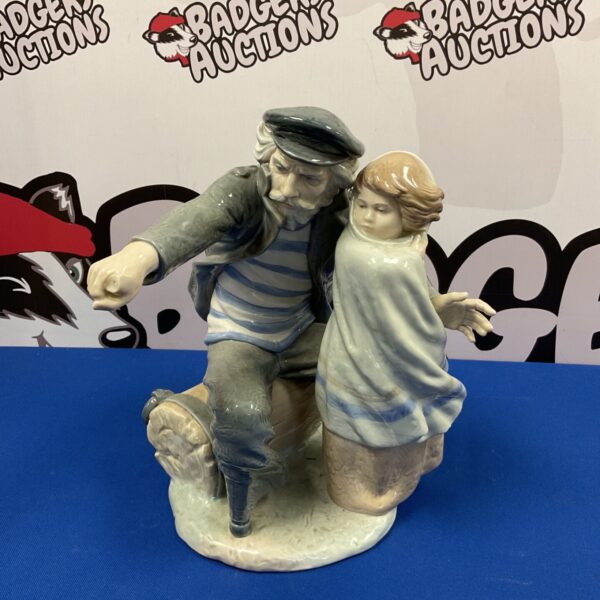 Nao Waiting for the Fisherman porcelain figurine, coastal collectible.
