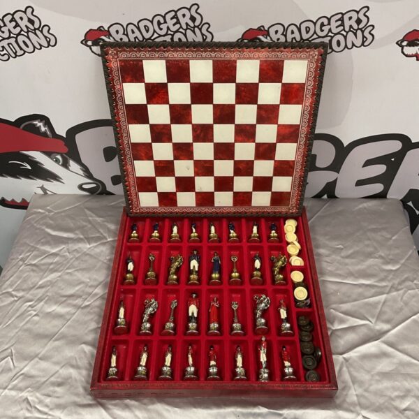 Open Napoleon & Wellington chess set with red and white board.