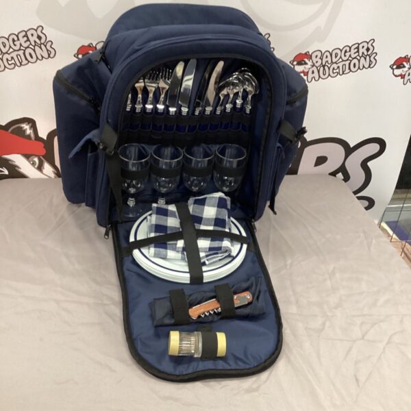 Navy and tartan rucksack picnic set with dining accessories.