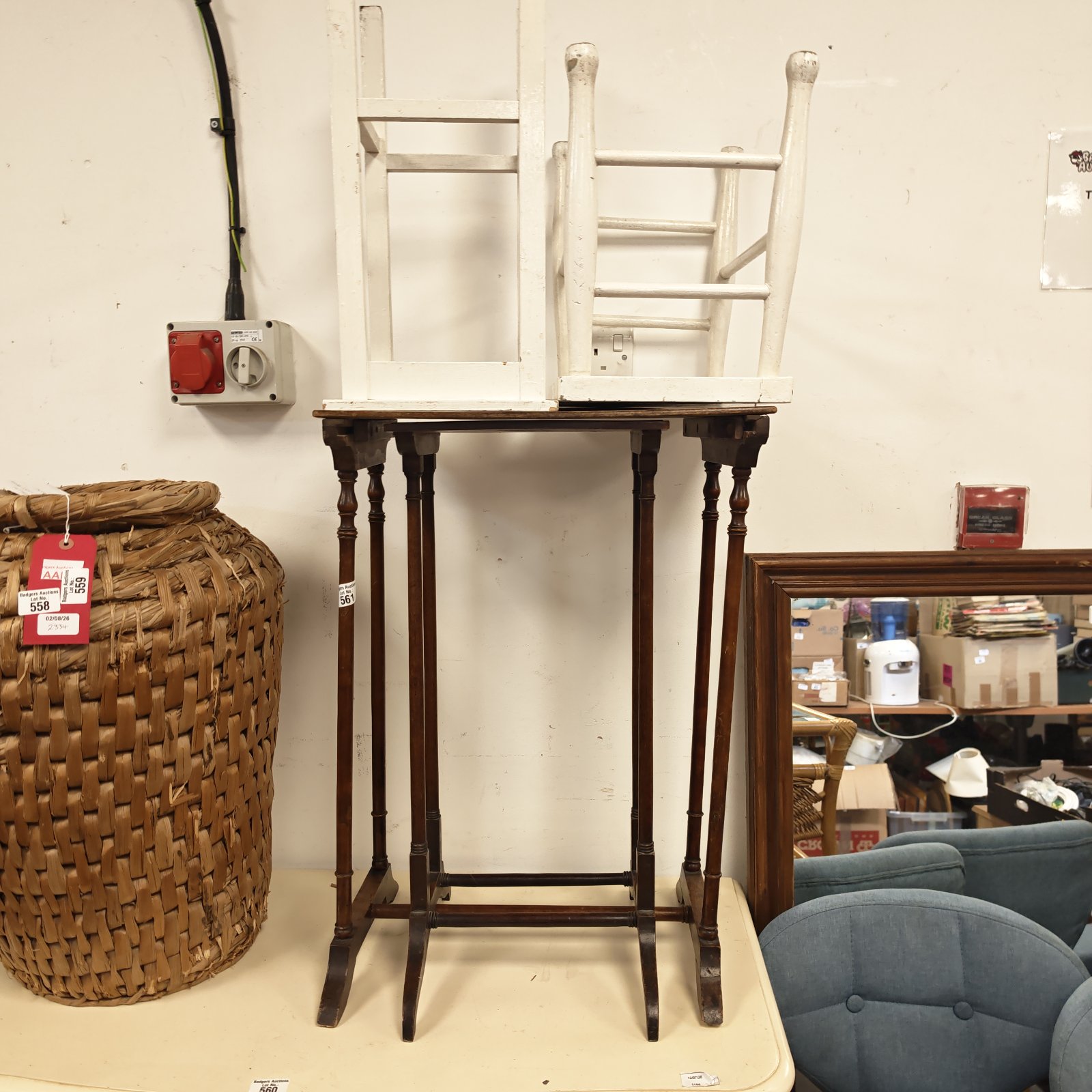 Vintage nest of tables and white painted stools for hallway or bedroom.