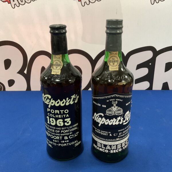 Two sealed bottles of vintage Niepoort Port wine from 1963.