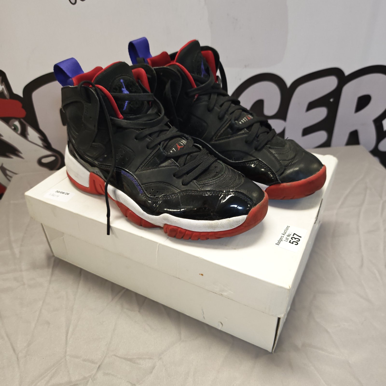Black and red Nike Jordan 8 Retro basketball shoes, size 8.