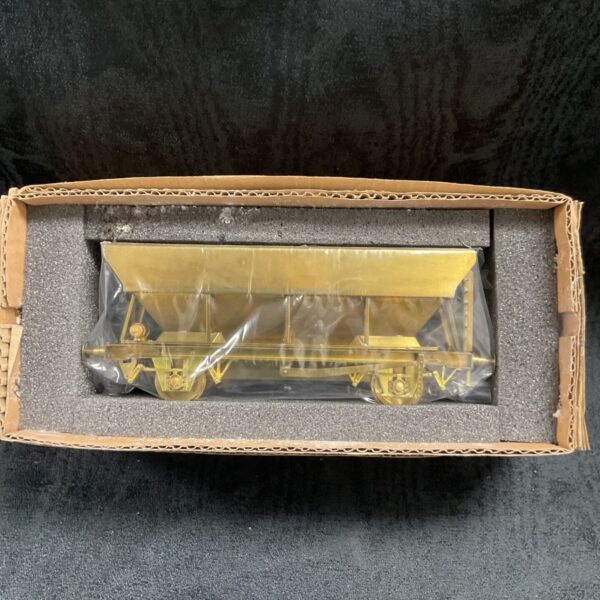 Detailed O gauge brass articulated hea hopper car, unpainted and as new.
