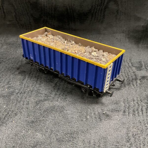 Vintage O gauge mineral wagon with coal load.