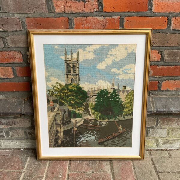 Framed Oxford Magdalen College tapestry depicting a river scene.