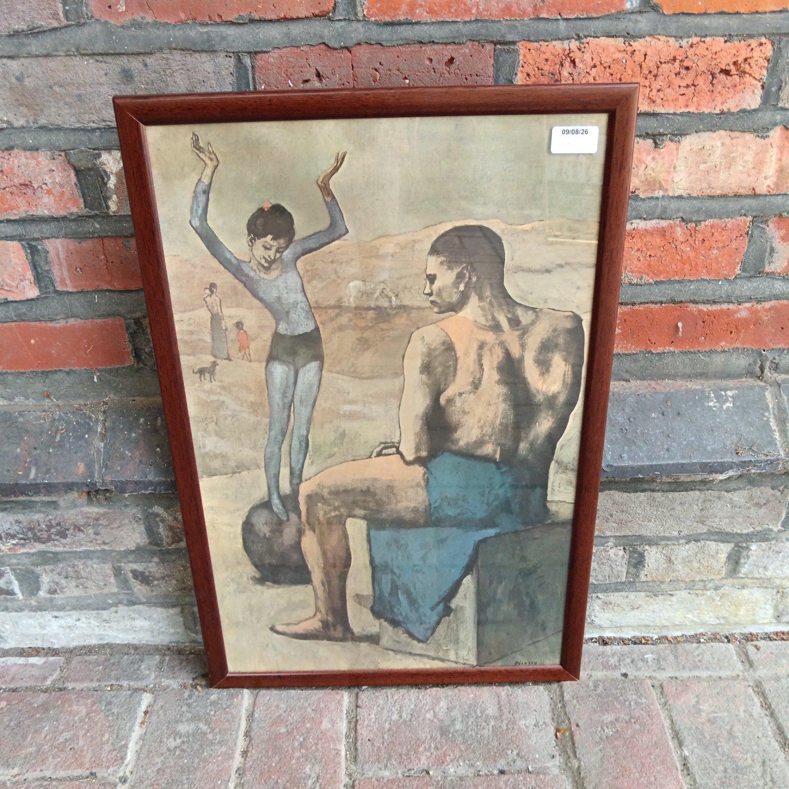 Vintage Pablo Picasso print of a girl balancing on a ball.