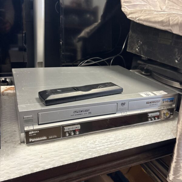 Panasonic DMR-E7 Superdrive DVD recorder with remote control.