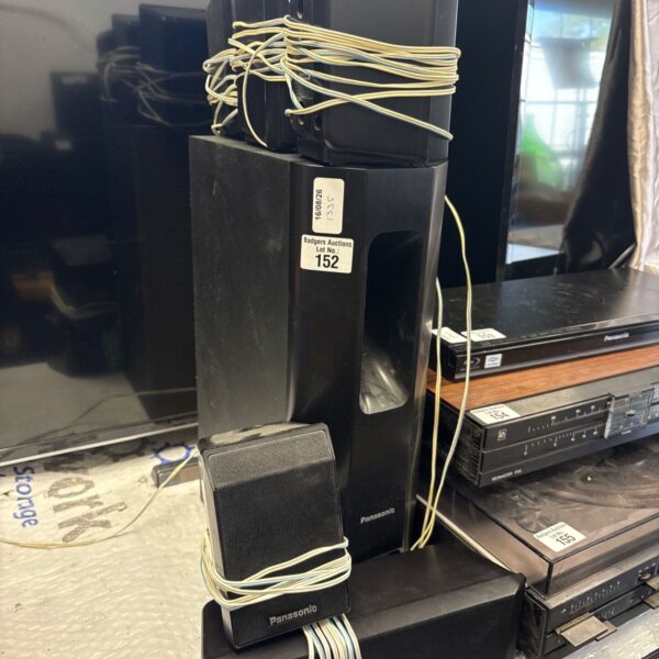 Vintage Panasonic subwoofer and speakers for home audio.