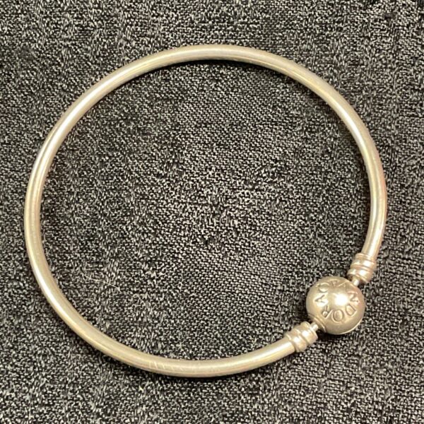 Silver Pandora bangle, ideal for charm bracelets and jewellery collections.