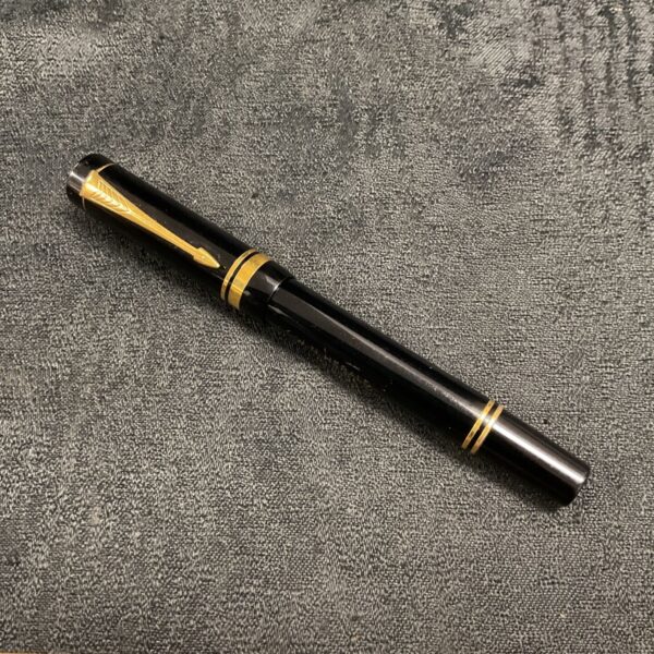 Vintage Parker fountain pen with gold trim and nib.
