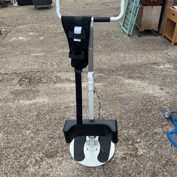 Patient turner machine with padded support and handles.