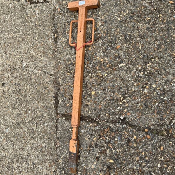 Vintage paver lifting tool for removing paving blocks.