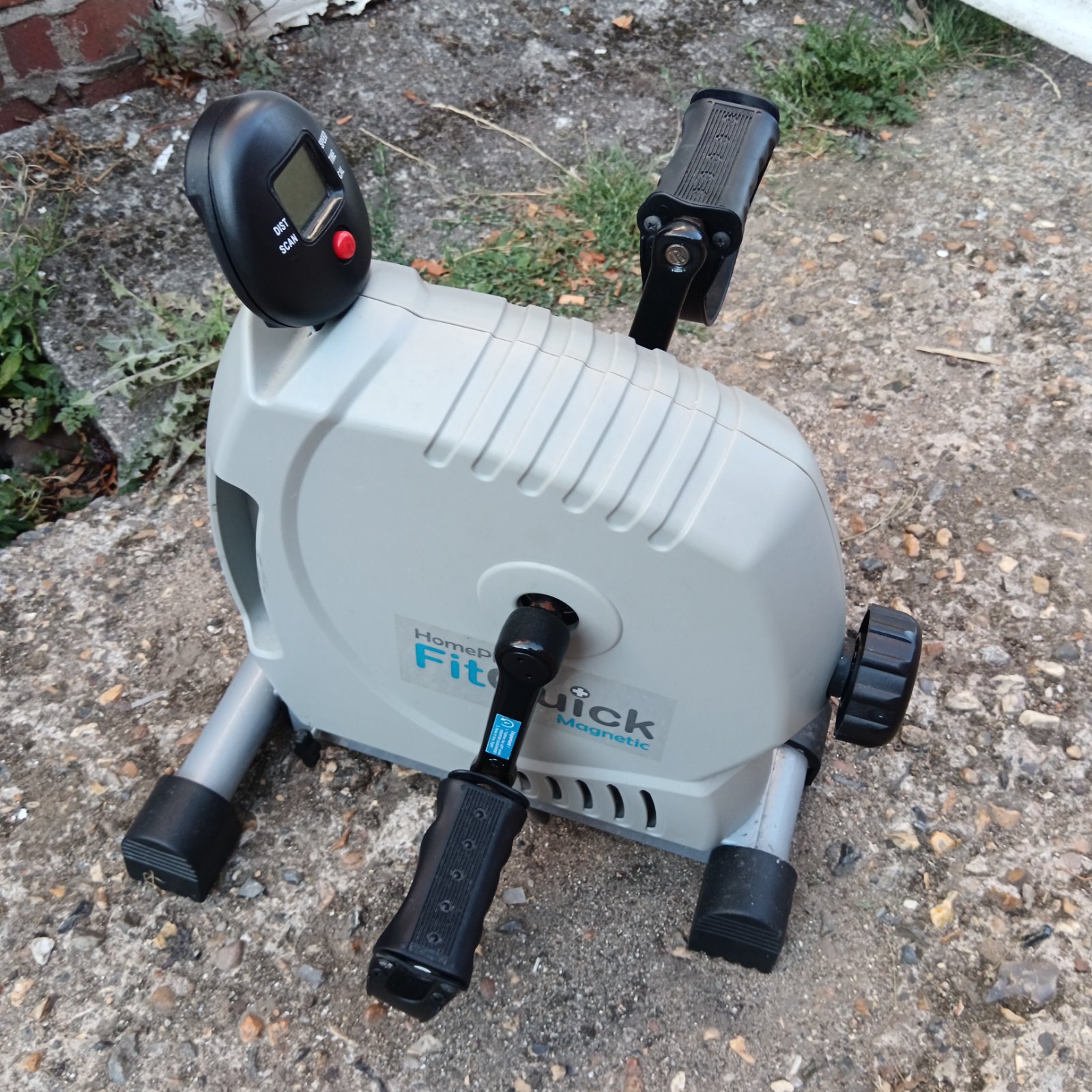 Compact pedal exerciser machine for home physiotherapy and fitness.