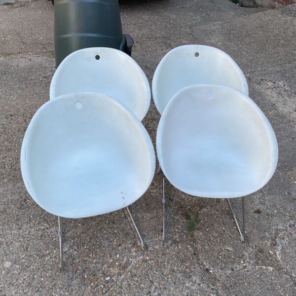 Set of Pedrali Gliss chairs outside a building.