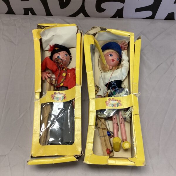 Vintage Pelham puppets, a pair of collectible string marionettes.