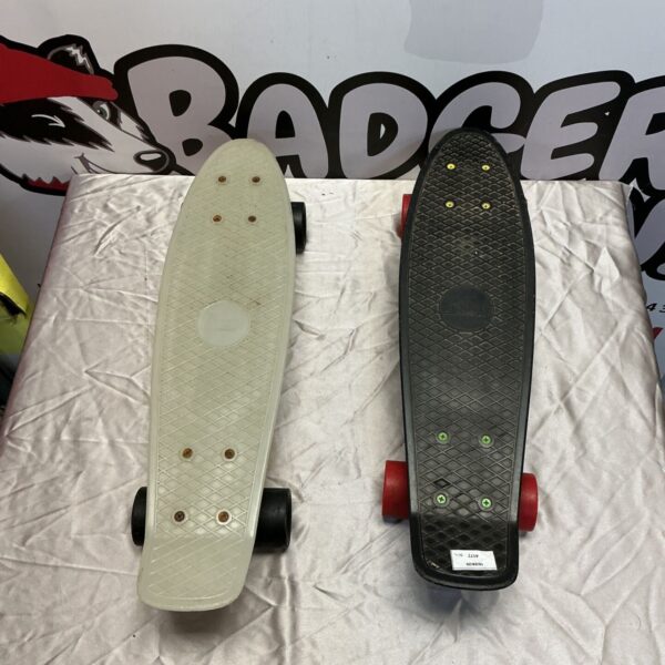 Two colourful Penny Boards for sale, ideal for skateboarding enthusiasts.