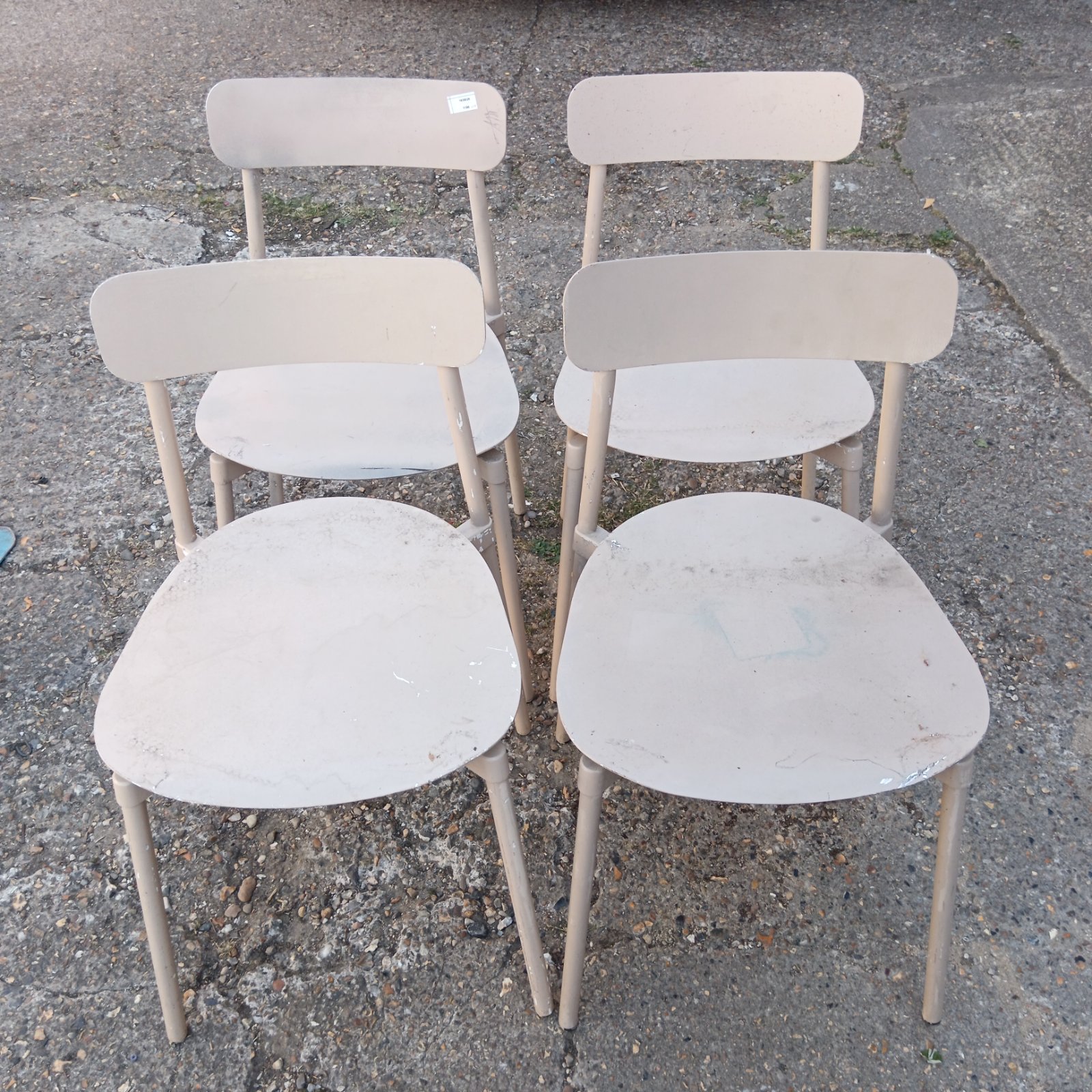 Set of four Petite Friture aluminium chairs in a modern setting.