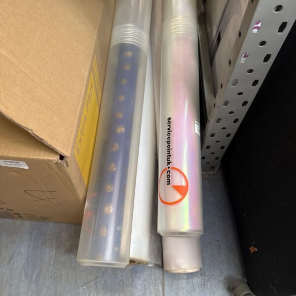 Stack of photography backdrop rolls for studio use.