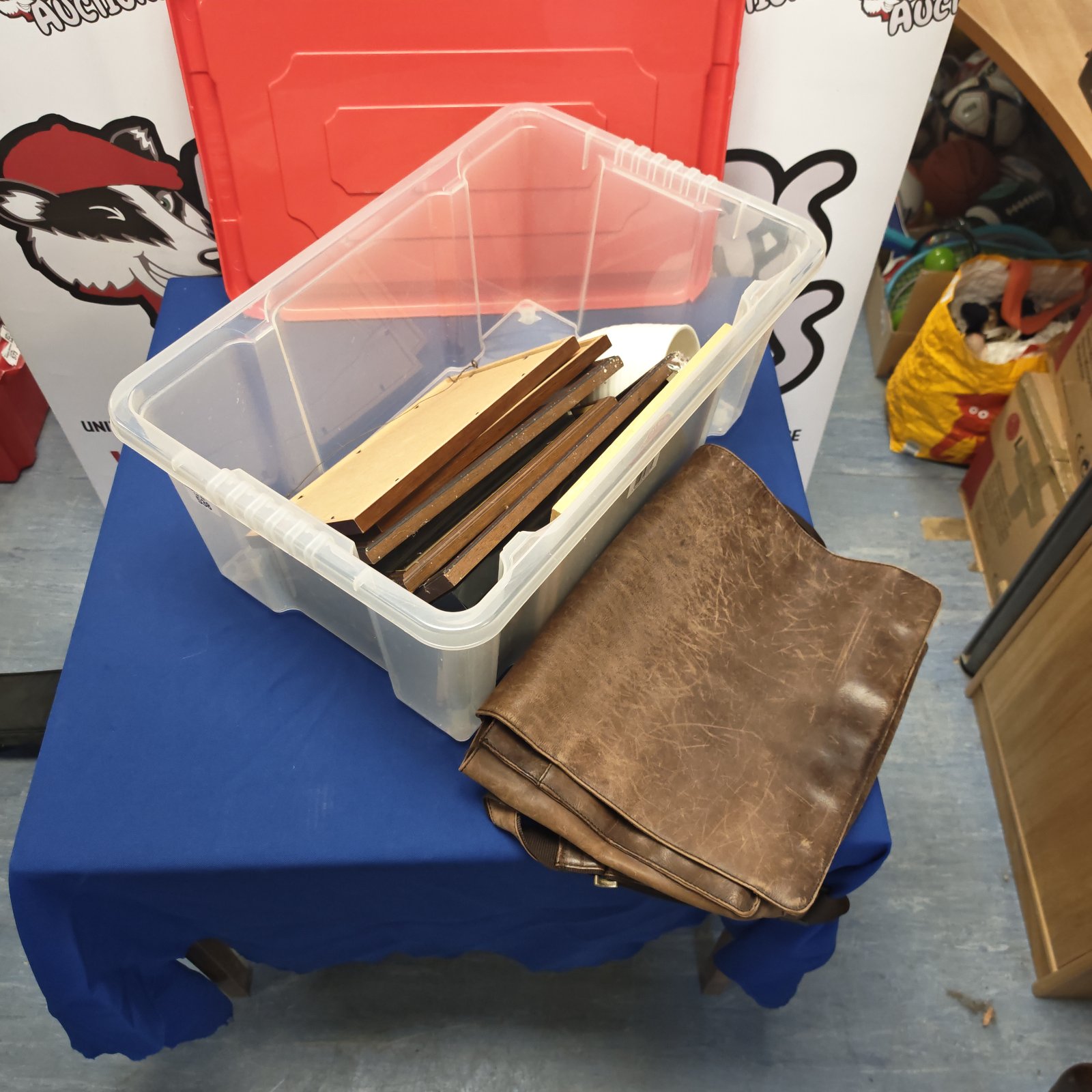 Mixed lot of wooden picture frames and a brown leather shoulder bag.
