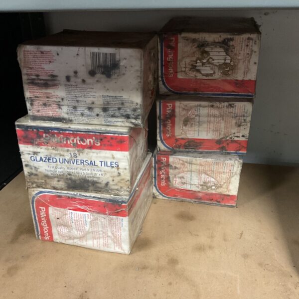 Stack of six boxes of vintage Pilkingtons glazed universal tiles.