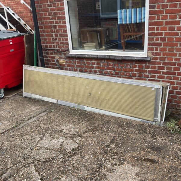 Used plastic corrugated roofing sheet for garden shed repair.