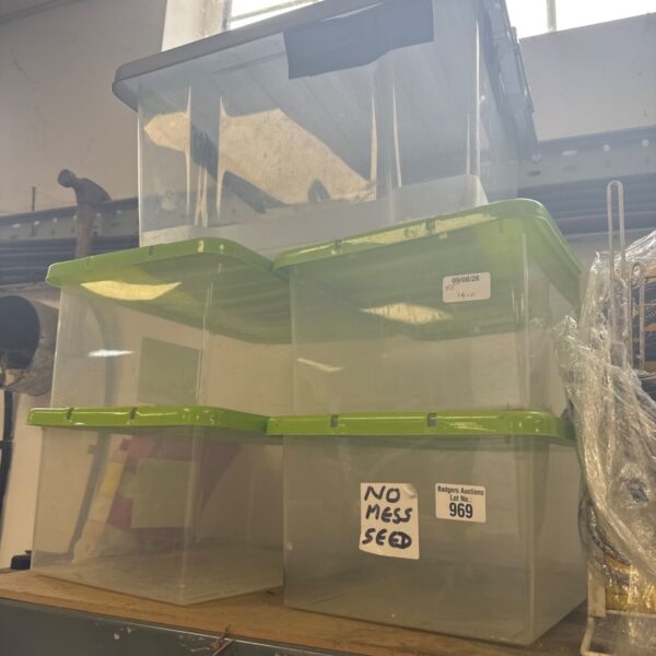 Lot of five small plastic storage boxes with lids.