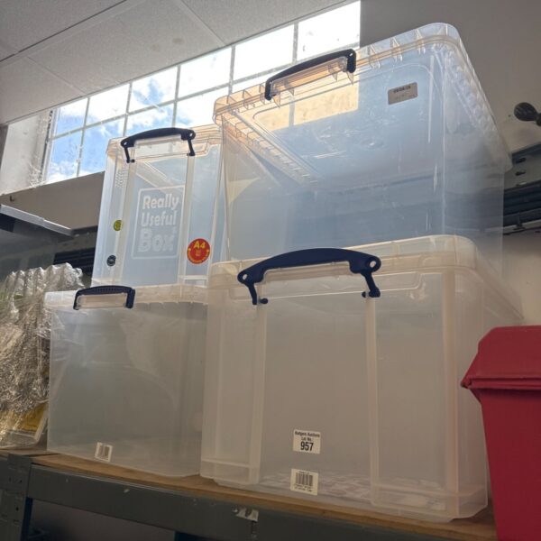 Assorted plastic storage boxes including a Really Useful Box.