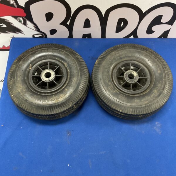 Pair of 10-inch pneumatic utility wheels with rubber tires.