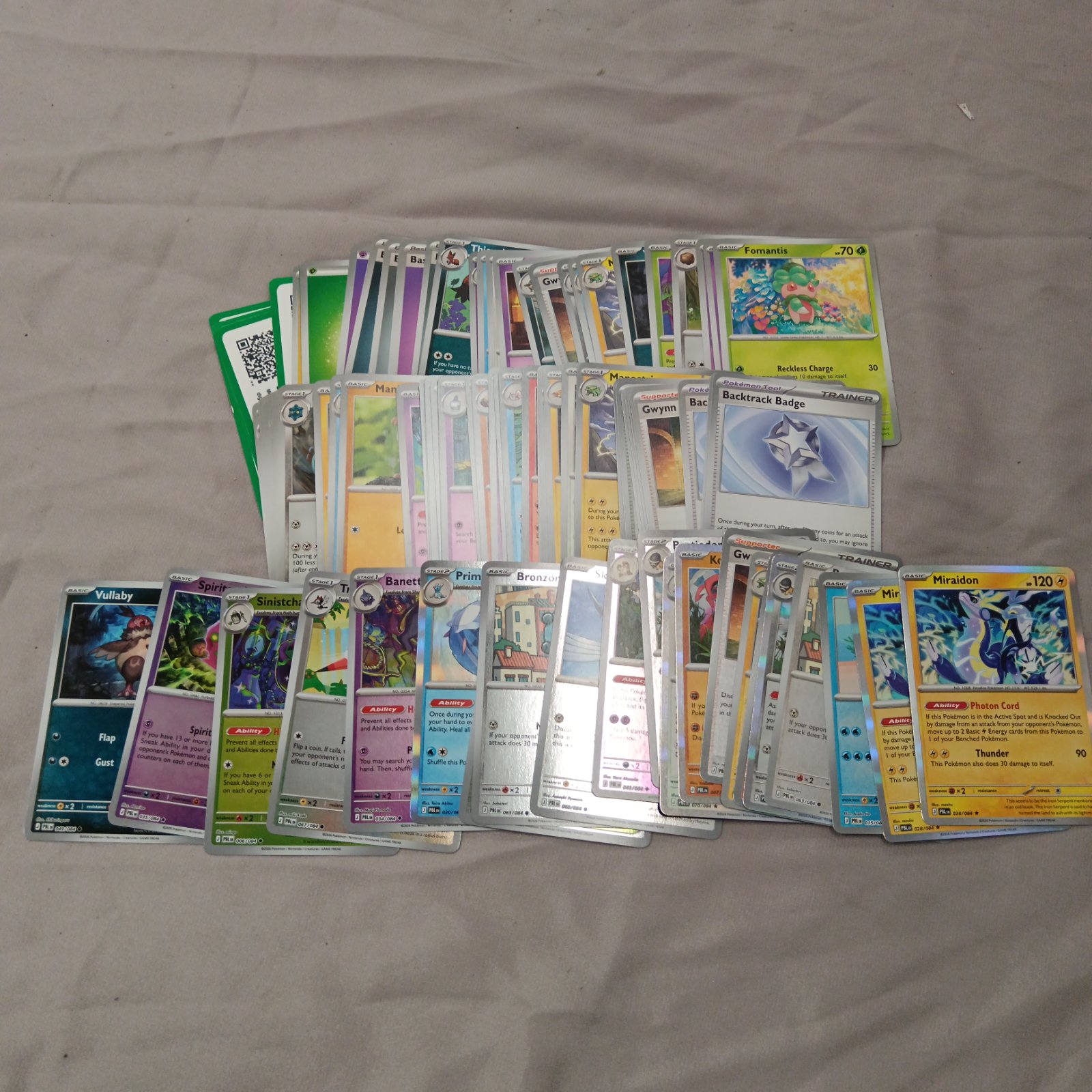 Pokémon card bundle featuring holographic trading cards for collectors.