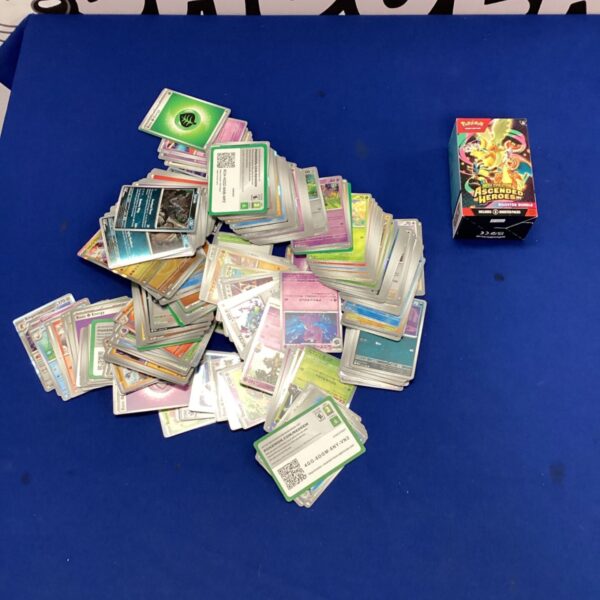 Pokemon card bundle featuring shiny cards and an Ascended Heroes booster.