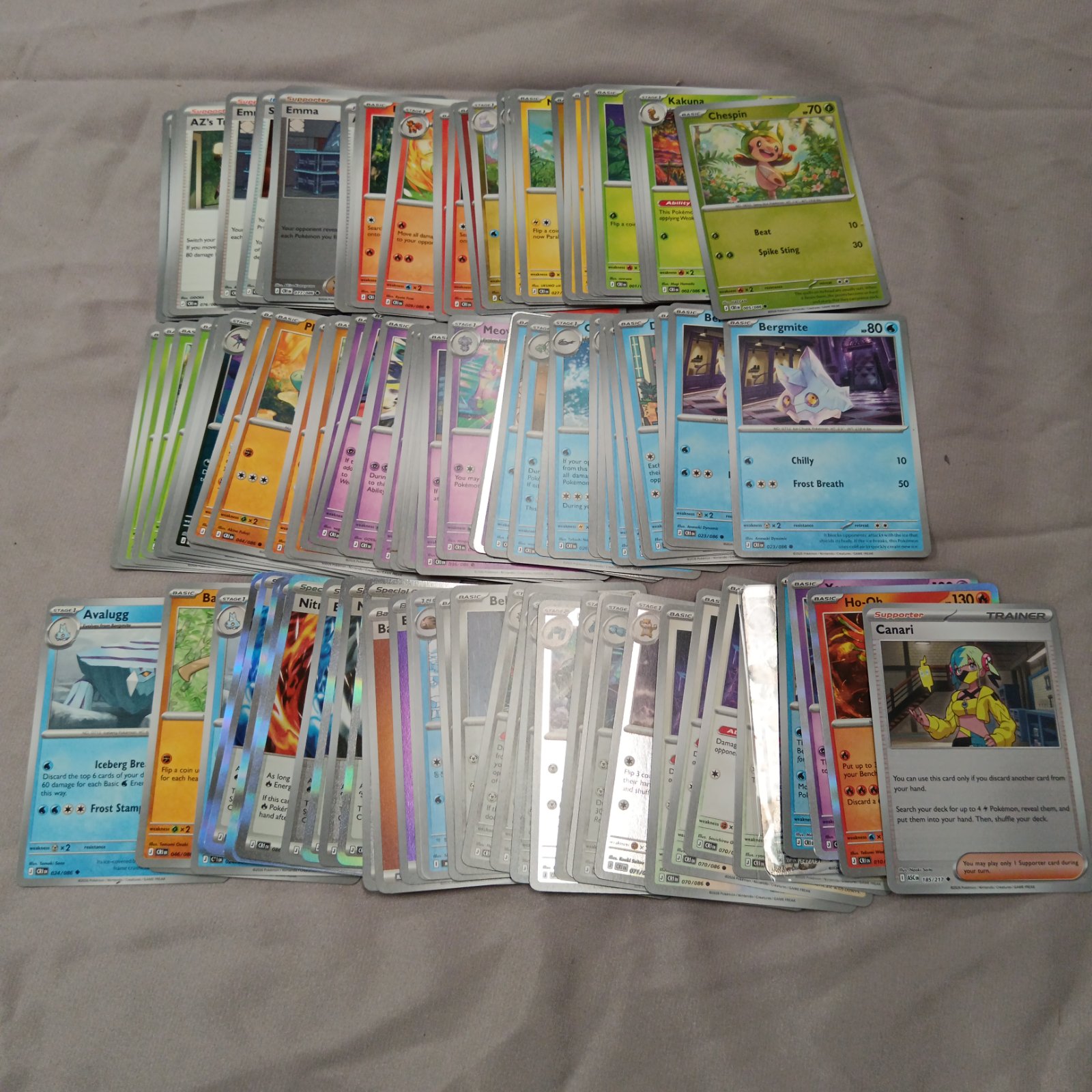 Pokémon cards lot with holographic cards for collectors.
