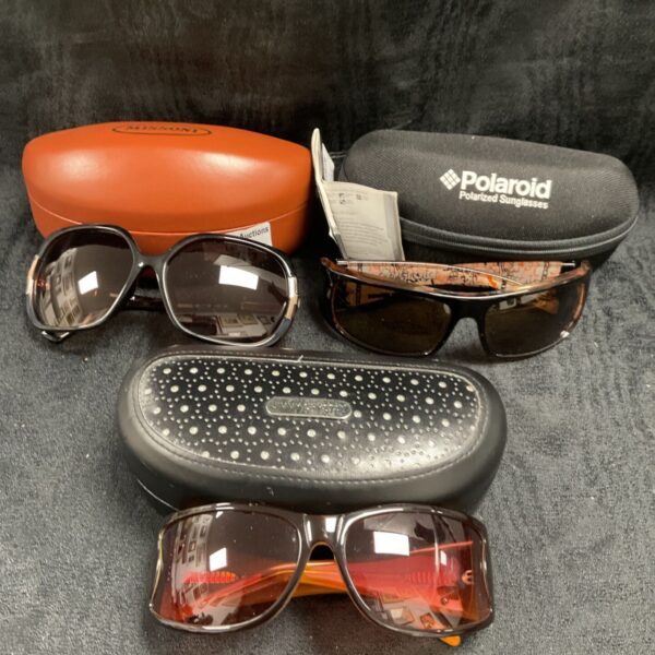 Lot of three pairs of Polaroid, Mission, and Jimmy Crystal sunglasses.