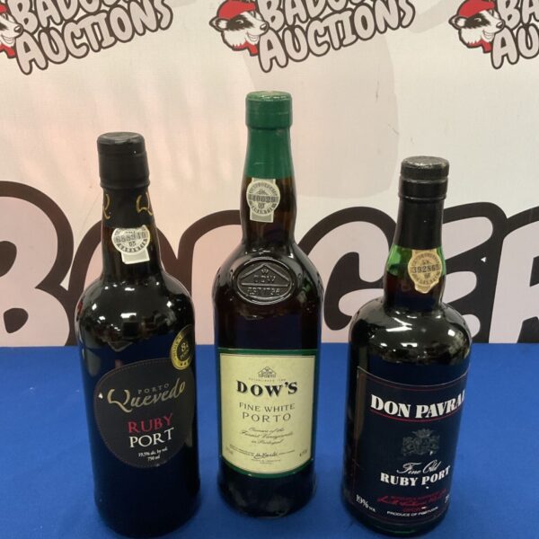 Sealed bottles of Dow's, Don Parval, and Quevedo ruby port wine.
