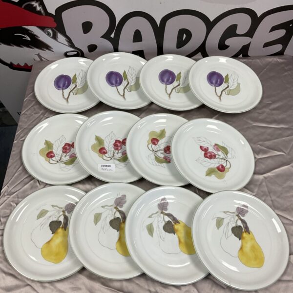 Set of twelve vintage Portuguese watercolor floral plates.