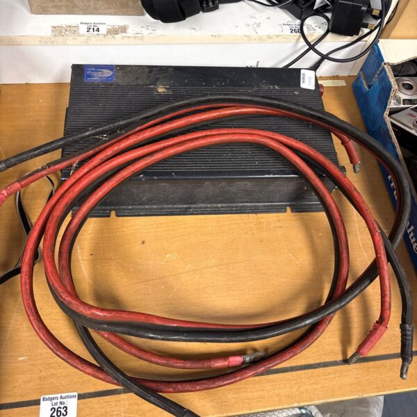 Red heavy-duty power inverter cables with ring terminal.