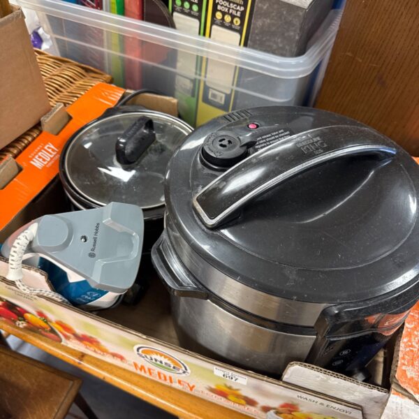 Household lot including a pressure cooker, iron and slow cooker.