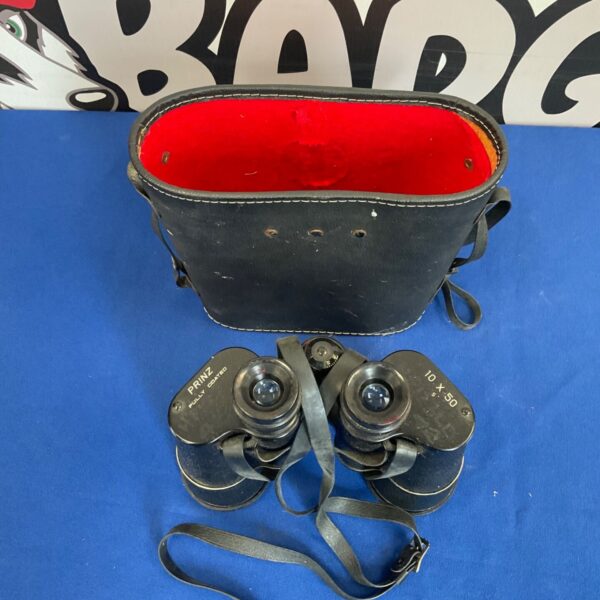 Vintage Prinz 10x50 binoculars with a worn case.